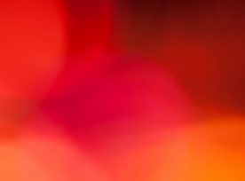 Abstract Defocused Orange And Red Circular Light Pattern