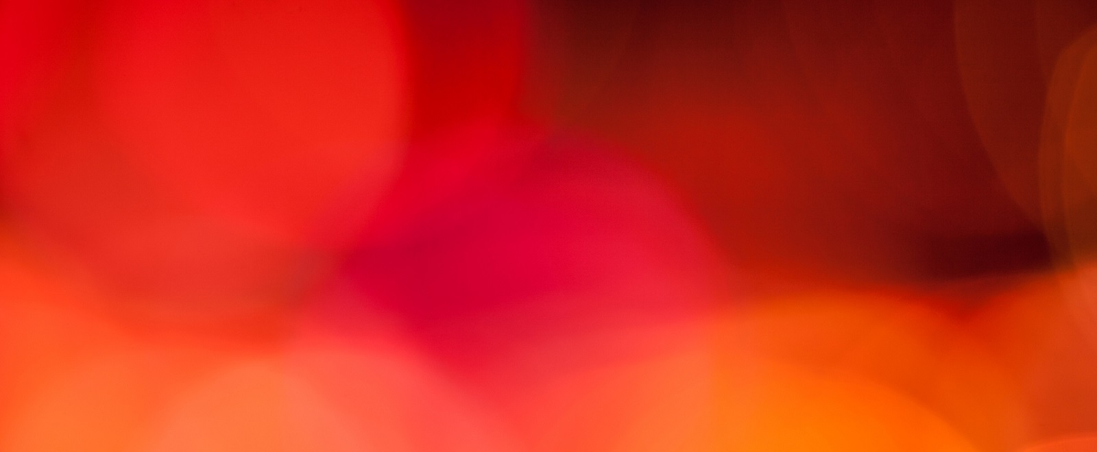 Abstract Defocused Orange And Red Circular Light Pattern