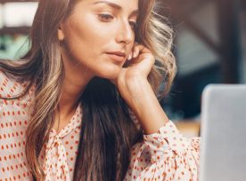 Woman Using Laptop