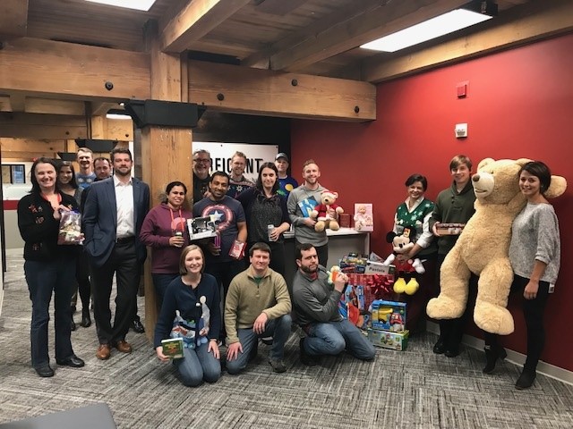 The entire perficient team with toys