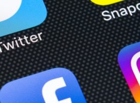 Apple Iphone X On Office Desk With Icons Of Social Media Facebook, Instagram, Twitter, Snapchat Application On Screen. Social Network. Starting Social Media App.