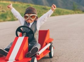 Young Business Boy Wins Go Cart Race