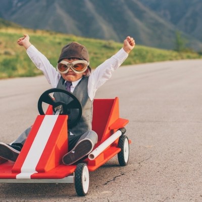 Young Business Boy Wins Go Cart Race