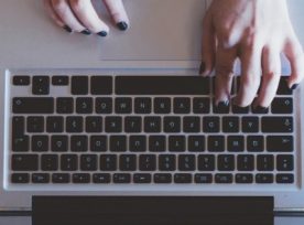 Woman Using Laptop Computer