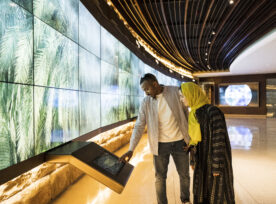 Tourists Using Technology In At Turaif Visitor’s Centre