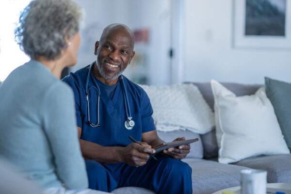 Homecare Nurse With A Patient