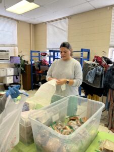 Kimberlie Rose from Perficient packing up meals for the unhoused
