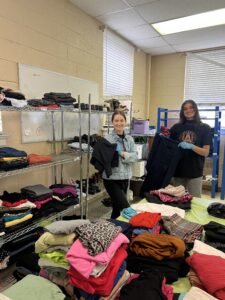 Perficient employees organizing donated clothing