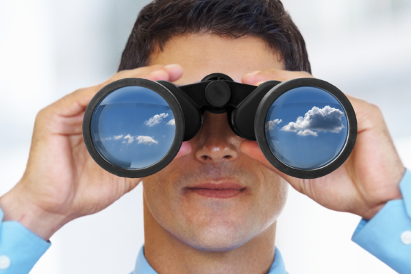 Man With Binoculars With Clouds In Them