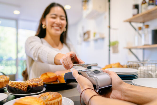 Costumer Making Contactless Payment In Cafe With Embedded Finance