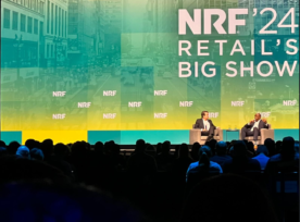 Magic Johnson presents a keynote address at NRF 2024.