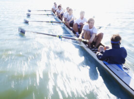 Men In Row Boat Oaring