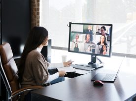 Woman Meets With Colleagues Virtually