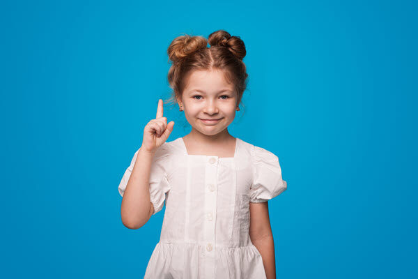 Photo of an inquisitive little girl that represents children who like to ask WHY?