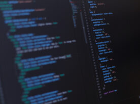 Close Up Software Developer Programming Code On Screen