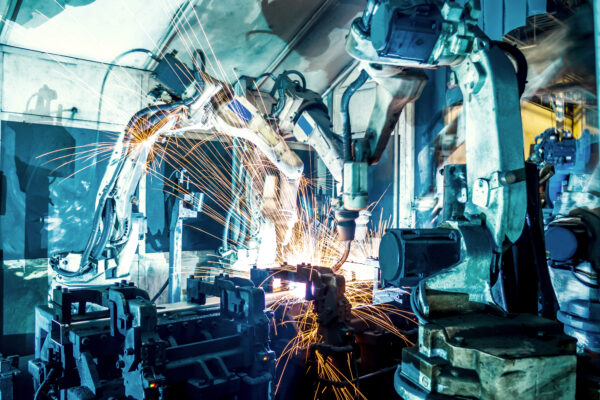Robots Welding In A Car Factory