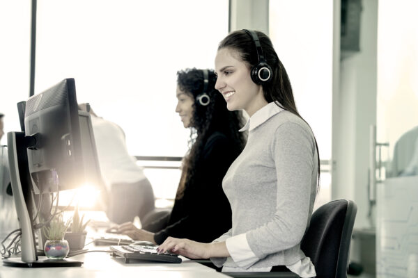 Women Sitting In A Call Center
