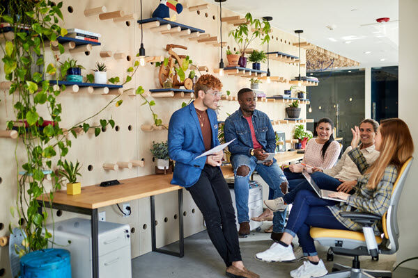 A young work team meeting and brainstorming.