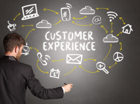 Istock 1214961329 Man At Board W 'customer Experience' And Icons (resized)