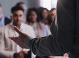 Closeup Shot Of An Unrecognisable Businessman Delivering A Presentation During A Conference