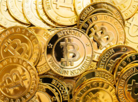 Bitcoin Cryptocurrency Background. A Bunch Of Golden Bitcoin, Digital Currency