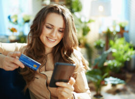 Woman In Sunny Day Making Online Shopping On E Commerce Website