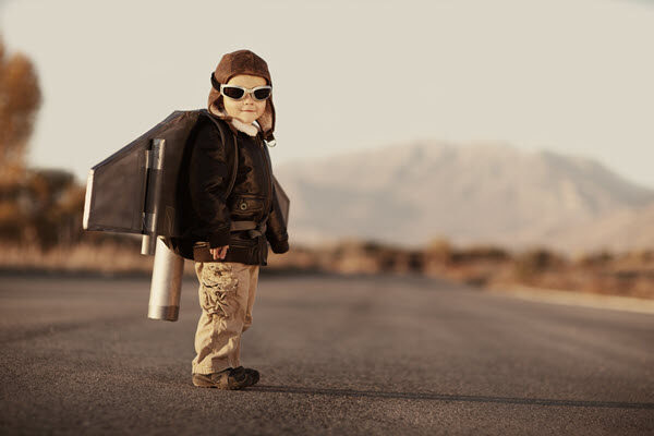Little boy pretending to be a pilot