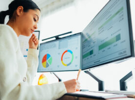Woman With Back Pain Working At Standing Desk Home Office