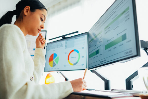 Woman With Back Pain Working At Standing Desk Home Office