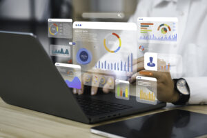 An Analyst Uses A Computer And Dashboard For Data Business Analysis And Data Management System With Kpi And Metrics Connected To The Database For Technology Finance, Operations, Sales, Marketing