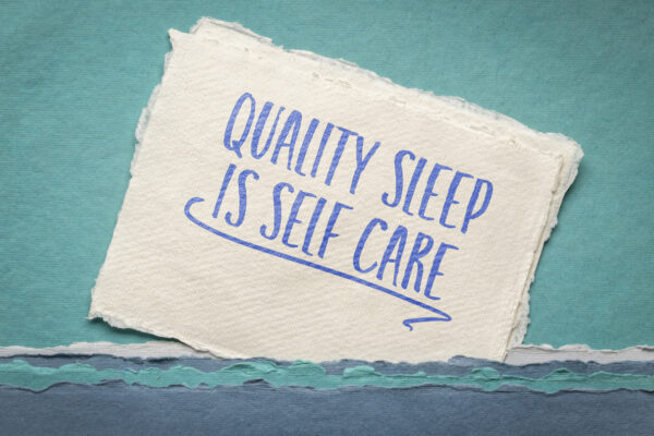 Quality Sleep Is Self Care Inspirational Reminder Note On An Art Paper, Healthy Lifestyle Concept
