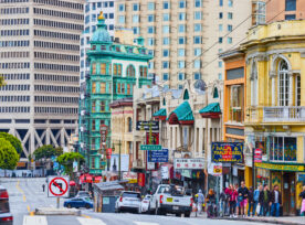 Street View Of Crowd Wandering Between Shops In San Francisco Inner City