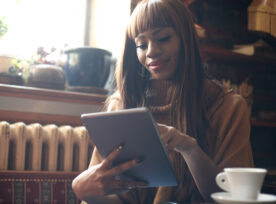 African Woman on tablet device