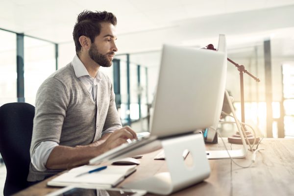 Man Working At His Computer