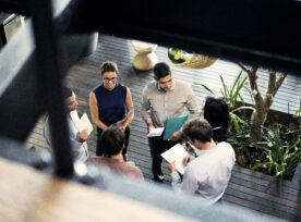 Business People Discussing At Lobby