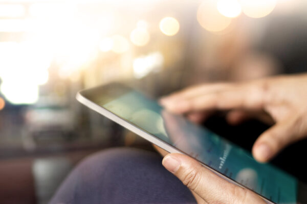 Businessman Using Tablet At Night Time