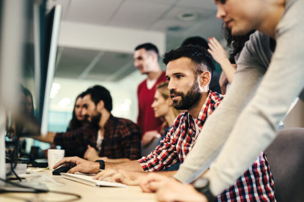 Portrait Of Programmers Working In Development Software Company