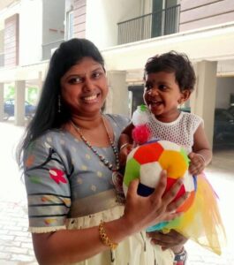 Ramya with her child