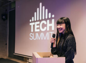 Japanese Young Businesswoman Speaking With Audience On Tech Conference.