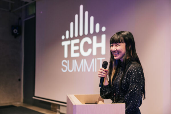 Japanese Young Businesswoman Speaking With Audience On Tech Conference.