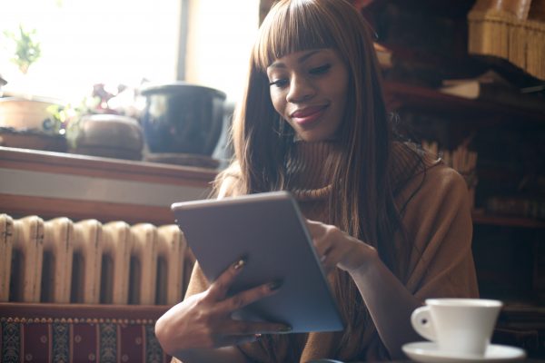 Beautiful African Woman On Her Workplace.