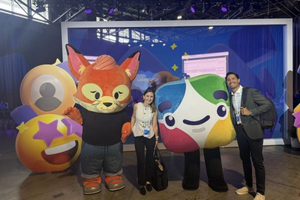 Perficient employees attend Connections 2026 and take picture with Salesforce characters