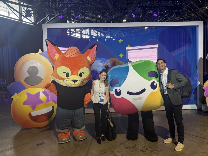 Perficient employees attend Connections 2026 and take picture with Salesforce characters