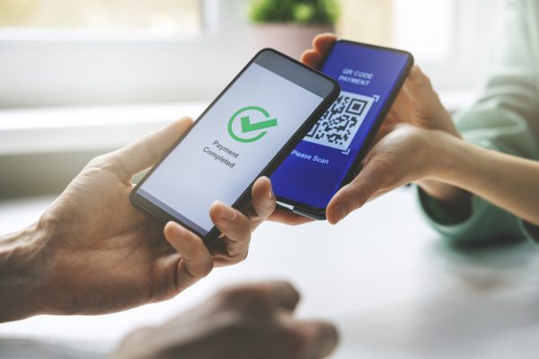 Qr Code Payment Person Paying With Mobile Phone